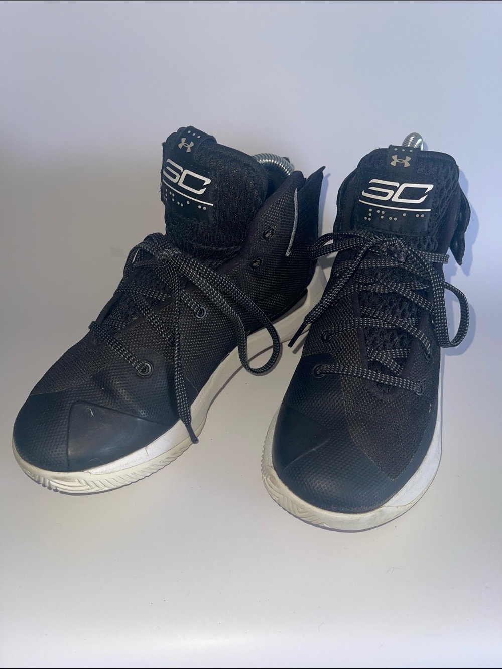 Under Armour Steph Curry Black and White High-Top Basketball Shoes